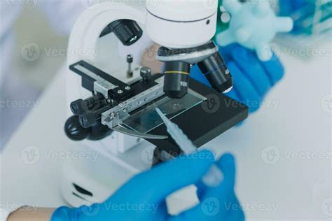 microscope with lab glassware, science laboratory research and development concept 23446178 ...