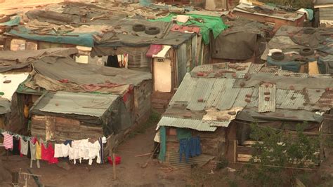 Stock Video Clip of Informal settlements close together in Durban, people | Shutterstock