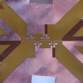 Photograph of the in-house fabricated PCB (chemical etching, sodium ...