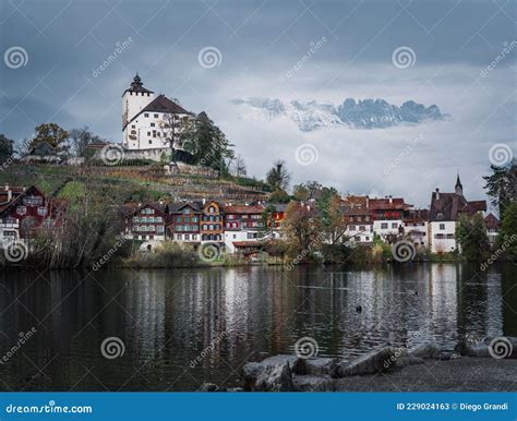 Skyline of Buchs with Werdenberg Castle, Werdenberg Lake and Alps Mountains on Background ...