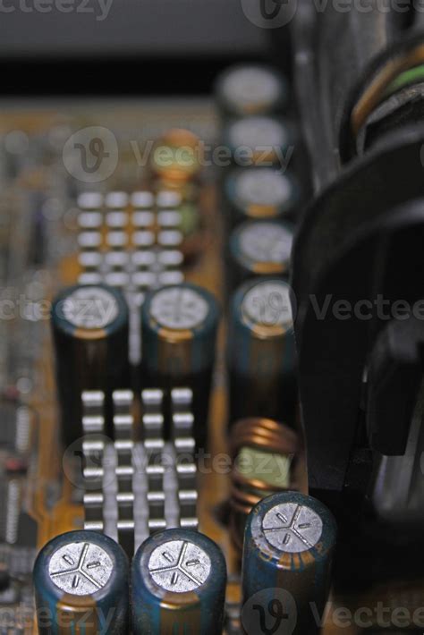 capacitors on a circuit board, Computer motherboard 784571 Stock Photo at Vecteezy