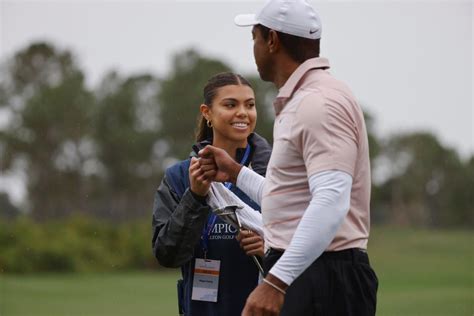 Tiger Woods' 16-year-old daughter Sam acted as his caddie for the first time. Here are 5 photos ...