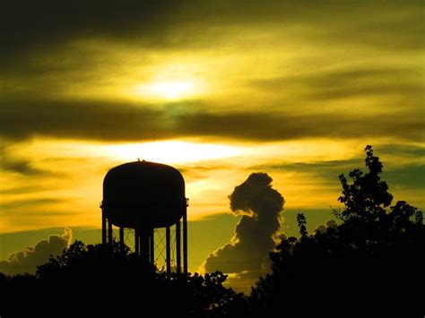 Water Tower on Golden Night Photograph by Captured by Trina M - Fine ...