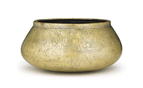 A FINELY ENGRAVED BRASS BOWL