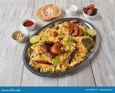 Chicken Mandi with Dates on a Wooden Table. Arabic Cuisine Stock Image - Image of asian, basmati ...