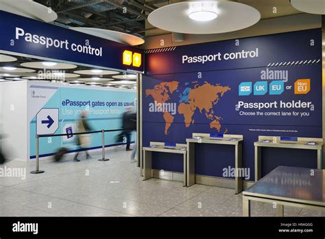 The UK and European separate passport control and immigration lanes at London Heathrow ...