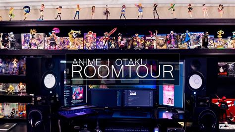 an anime room tour poster is displayed in front of a computer desk and shelves full of action ...