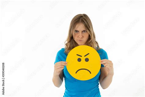 Beautiful young woman holding angry face emoji in social media notification icons Stock Photo ...