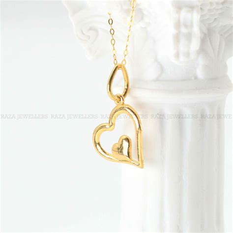 HEART SHAPE GOLD LOCKET - Raza Jewellers