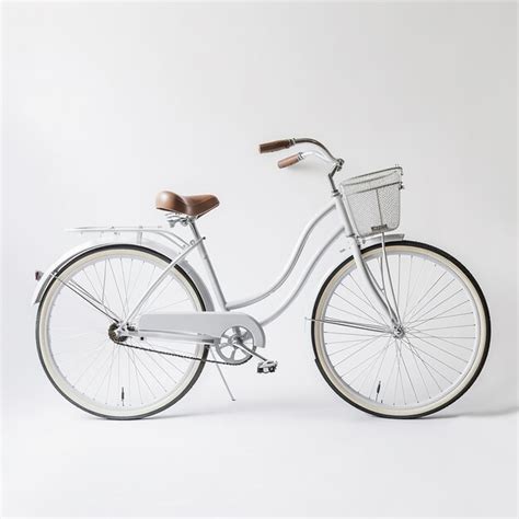 Premium AI Image | A white bike with a basket on it