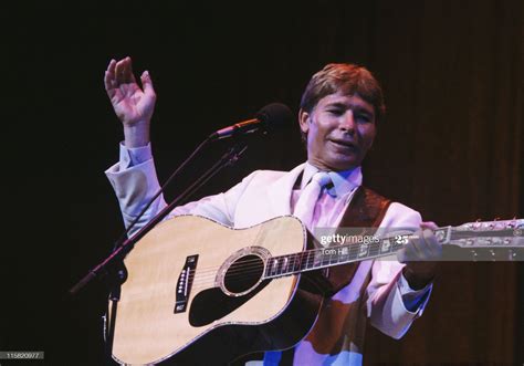 American musician John Denver performs a private concert at the... | John denver, Denver photos ...