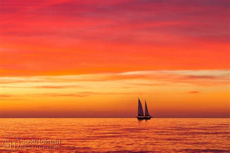 Sailboat and a Pink and Orange Sunset in Venice, Florida