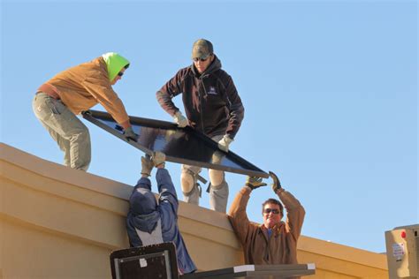 Lifting Solar Panel Module to the Roof of the Nature Center – Pajarito Environmental Education ...