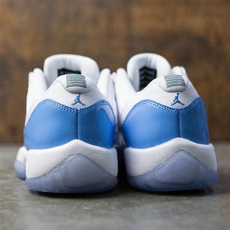 Air Jordan 11 Retro Low (GS) Big Kids (white / university blue) | Air jordans, Jordan 11 retro ...