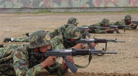 Chinese firing line with Type 81 rifles. : r/Military_equipment