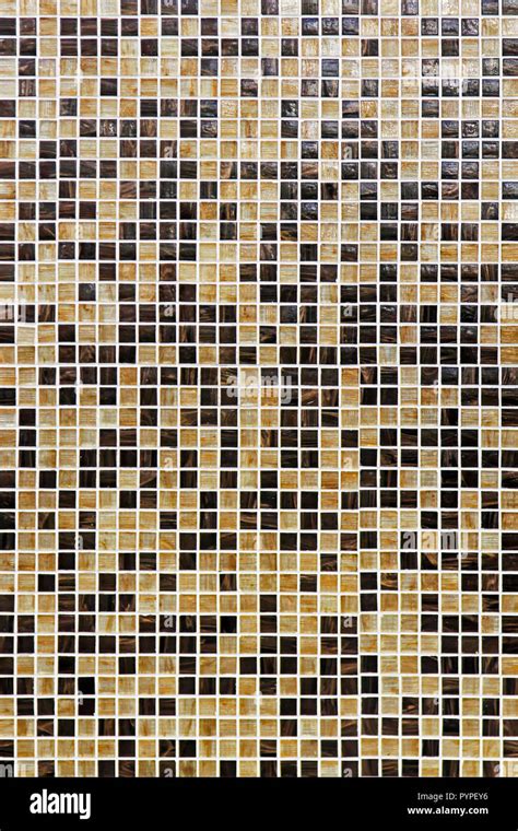 Brown and beige small mosaic wall tiles Stock Photo - Alamy