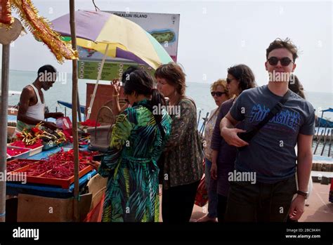 Tourists at Kalijai Temple, Chilika Lake, Odisha, India Stock Photo - Alamy