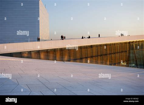 People on the Oslo Opera house roof Stock Photo - Alamy