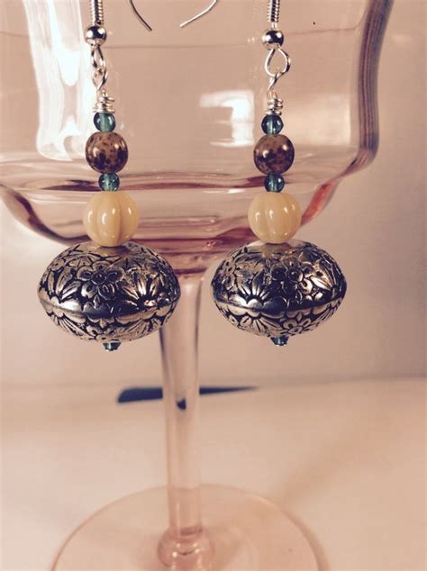 Dangle earrings by StonePearlCoralLLC on Etsy