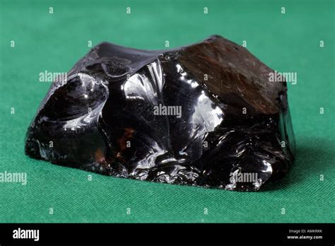 Obsidian, volcanic glass, studio picture Stock Photo - Alamy