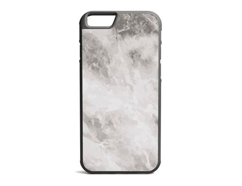 an iphone case with white marble on it