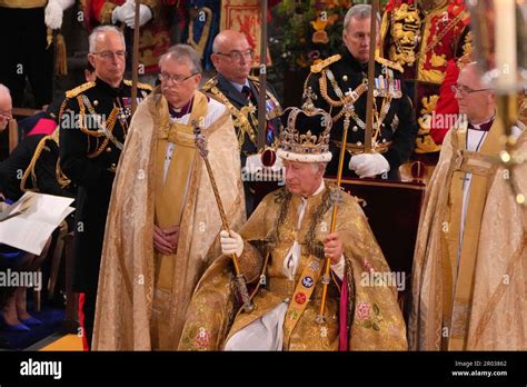 King Charles III after being crowned with St Edward's Crown by The ...