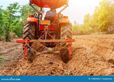 Tractors Plow The Land Is Adjusting To A Class Of The Field. Royalty-Free Stock Image ...