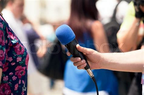 A journalist is making a interview with ... | Stock image | Colourbox