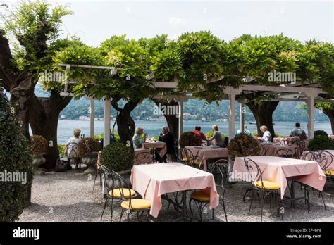 Outdoor restaurant in Bellagio Lake Como Lombardy Italy Stock Photo - Alamy