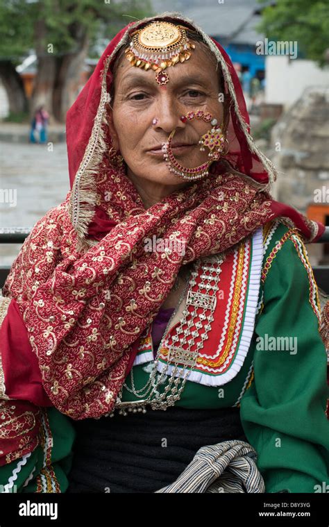 A Gaddi tribeswoman wears her finery at a celebration in the Chamba ...