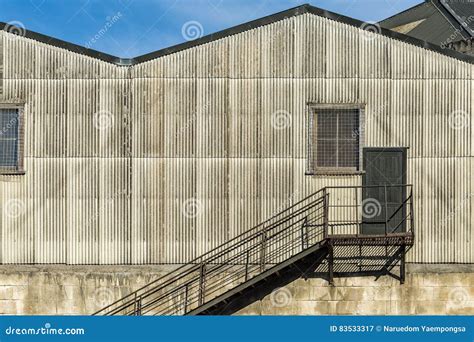 Exterior of old warehouse stock image. Image of iron - 83533317