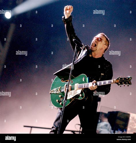 Bono u2 performing live in concert at amsterdam arena amsterdam hi-res stock photography and ...