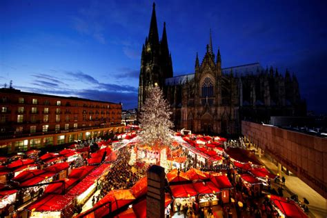 Twinkling holiday lights spread cheer around the world