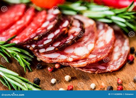 Three Types Of Salami With Herbs And Peppercorn Stock Photo - Image of ...