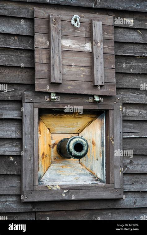 Pirate ship cannon window on old galleon Stock Photo - Alamy