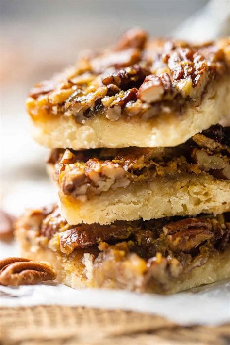 Pecan Pie Bars: Gooey, nutty filling over a buttery crust. -Baking a Moment