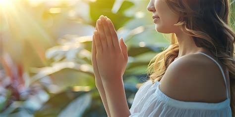 Premium Photo | Woman with clasped hands in prayer seeking spiritual guidance and peace Concept ...