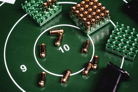 Green Shooting Target with a Lot of 9mm Ammunition Free Stock Photo ...