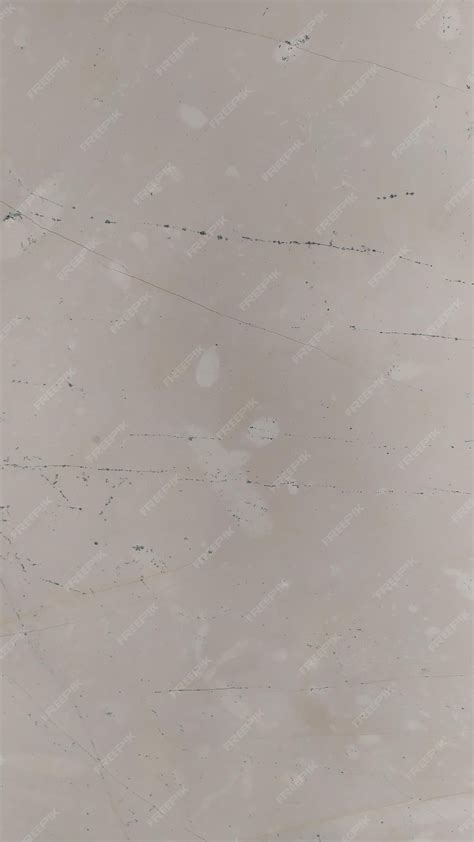 Premium Photo | A gray wall with a marble texture