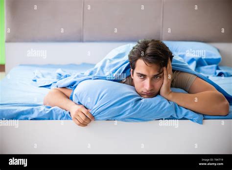 Man suffering from sleeping disorder and insomnia Stock Photo - Alamy