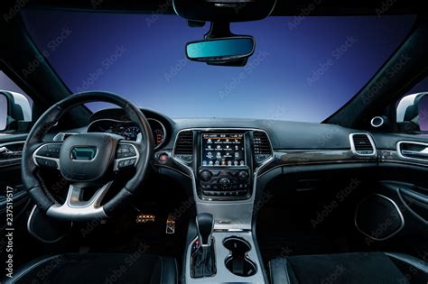 the interior of a modern luxury SUV Stock Photo | Adobe Stock