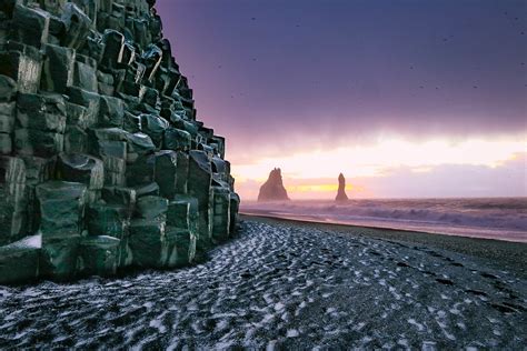 Reynisfjara Black Sand Beach is a must-see in Iceland - Adventurous Miriam