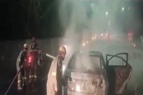 Car Catches Fire Near Mahamaya Flyover in Noida, Fire Tenders Rush to Spot | Watch