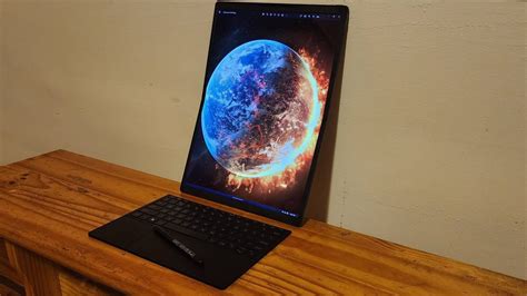 This $5,000 foldable laptop is wild. Watch it transform into 3 ...