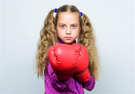 Premium Photo | Girl cute child with red gloves posing on white background. Cute kid with sport ...