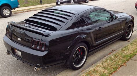 Black 2007 Mustang GT with Raxiom 2013 style tail lights, shaved rear ...