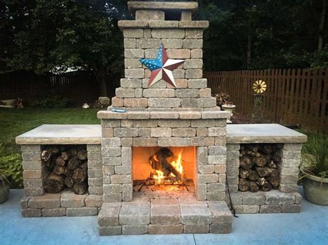 Outdoor Stone Fireplace With Wood Storage - img-pansy