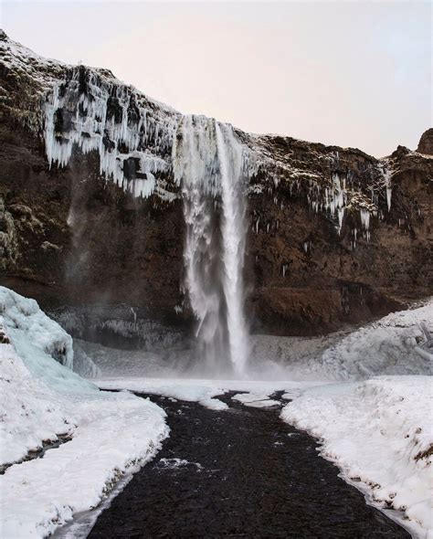 Seljalandsfoss. - Iceland. From a very cold morning on a day where the ...