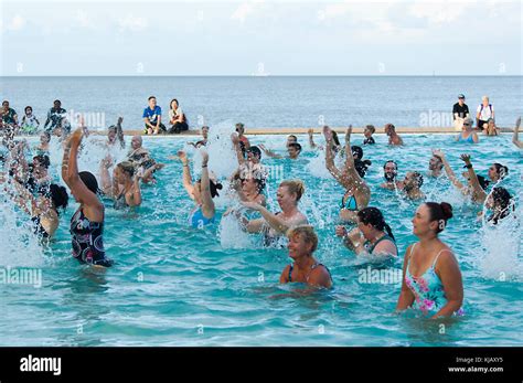 A group of people enjoying a fitness class of Aqua Zumba at the Lagoon in Cairns, Far North ...