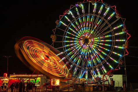 Colorful Carnival Ferris Wheel Ride At Night Photograph by Jerry Cowart